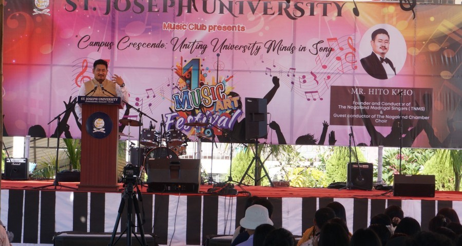 Founder and conductor of the Nagaland Madrigal Singers, Hito Kiho addressing the 1st Music & Art Festival at SJU on October 31.